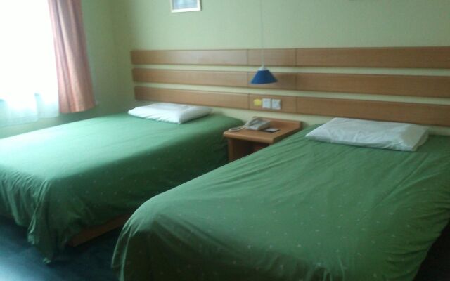 Home Inn – Guest Rooms – Qingdao
