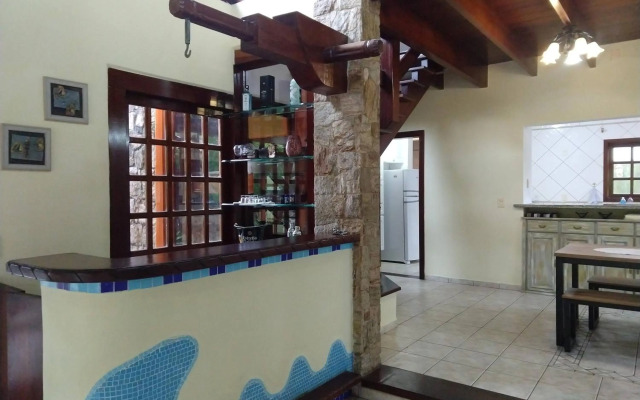 Casa 5 suítes com piscina e churrasqueira