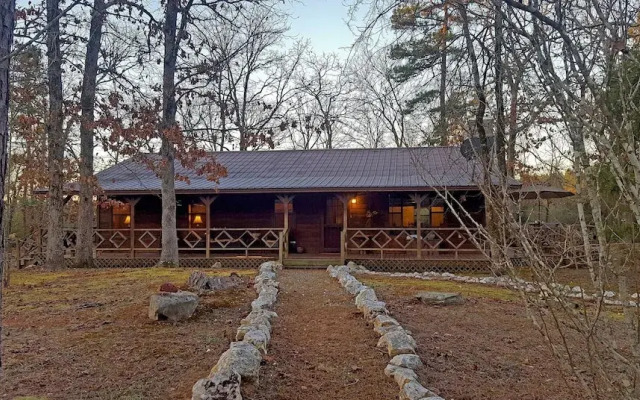 Cast Away Family Cabin with Hot Tub, Fireplace, and Kids Area by RedAwning