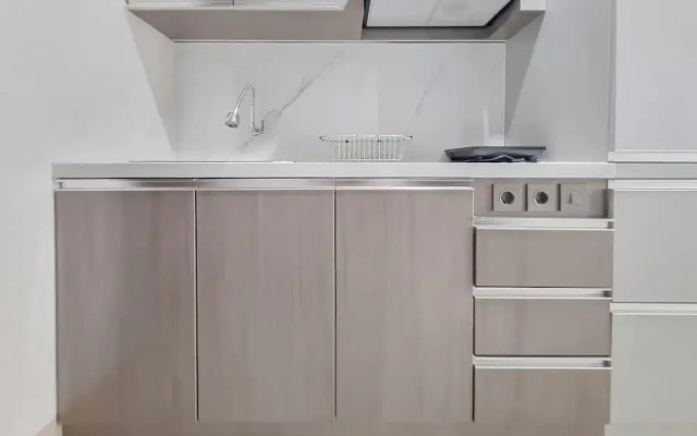 Homey And Scenic Studio At Patraland Amarta Apartment