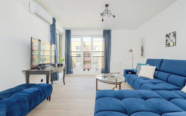Wroclaw Dark Blue Apartment by Renters