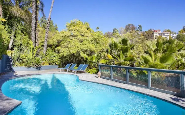 MidCentury Poolview Retreat by LuxPads