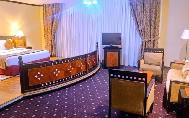 Отель Rolla Suites