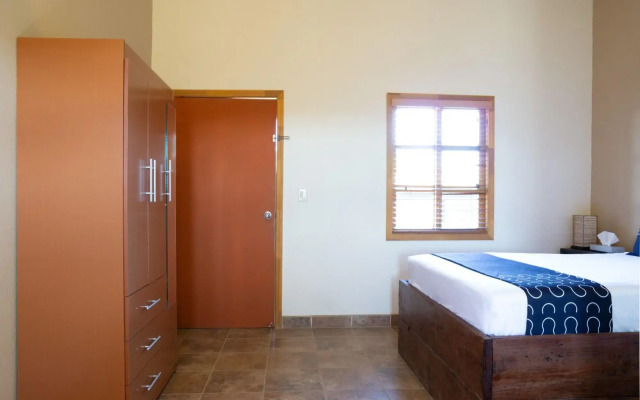 Capital O Hotel Villa Azura