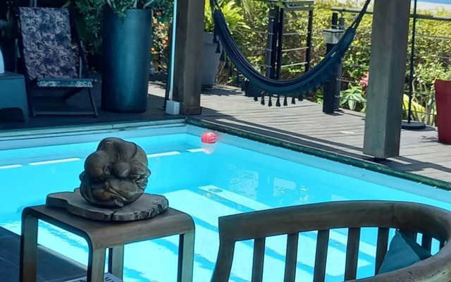 Suite INDIGO JACUZZI PRIVE PISCINE VUE MER acces cuisine laverie