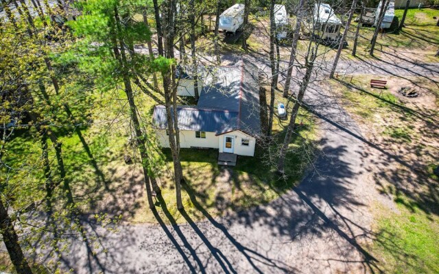 Rustic Cabin w/ Fire Pit, Steps to Sand Lake!