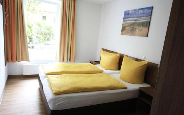 Ferienwohnung-304-Hohe-Lith-strandnah-mit-eigenem-Strandkorb-am-Meer