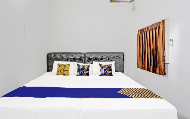 Spot On 91523 Kenari Guesthouse