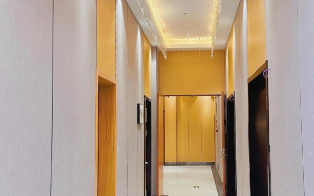 Wanjia Business Hotel (Zaozhuang Maoyuan)
