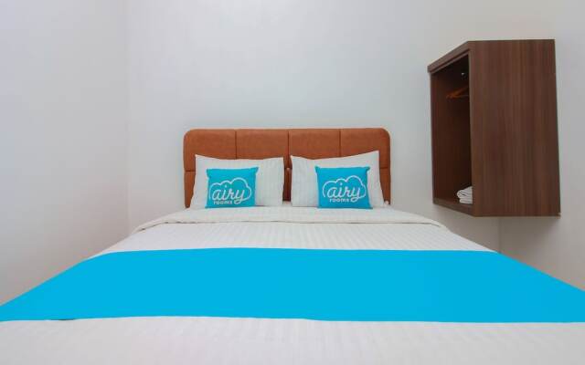 Airy Mapanget AA Maramis Manado