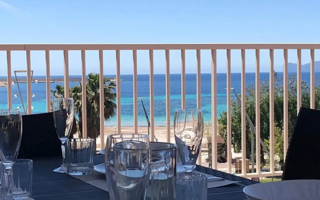 Alghero, Lighthouse Penthouse with sea view and beach front