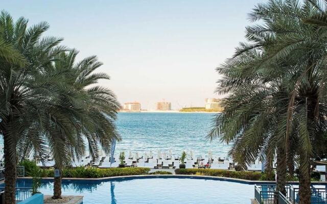 Shoreline Beachfront Luxury Palm