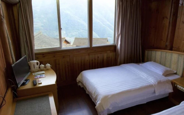 Guzhuang Family Hotel – Guest Rooms – Guilin