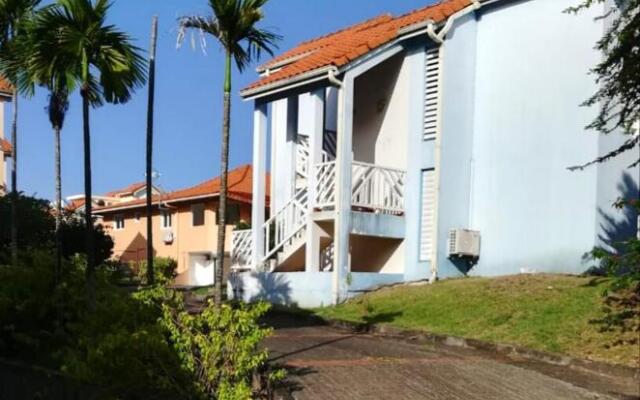 Appartement d'une chambre avec piscine partagee jardin clos et wifi a Sainte Anne a 1 km de la plage