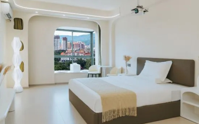 North Latitude 21°C Smart Hotel (Jinghong Peacock Lake Branch) – Guest Rooms – Xishuangbanna