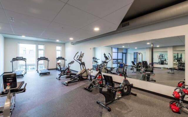 Flexhome Skywalk to Fiserv U3 RooftopGymParking