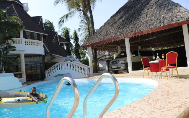 "room in Guest Room - A Wonderful Beach Property in Diani Beach Kenya.a Dream Holiday Place."