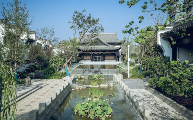 Xinhualian Lv Xin Gu Hotel