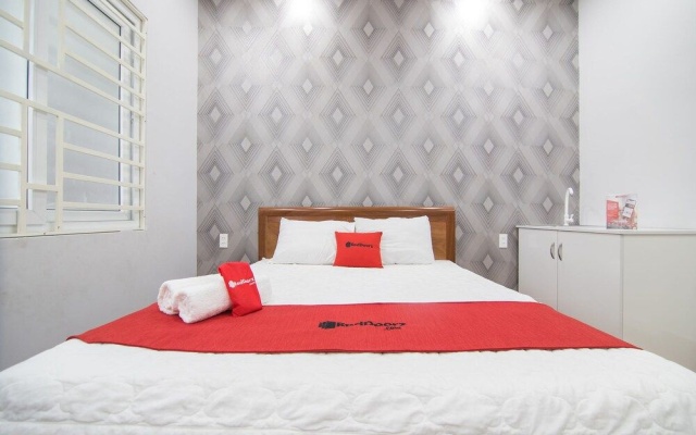 Reddoorz Plus @ Huynh Tan Phat – Guest Rooms – Ho Chi Minh City