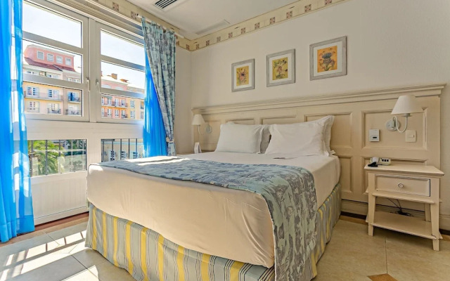 Suite com cozinha dentro de hotel ILCTOP