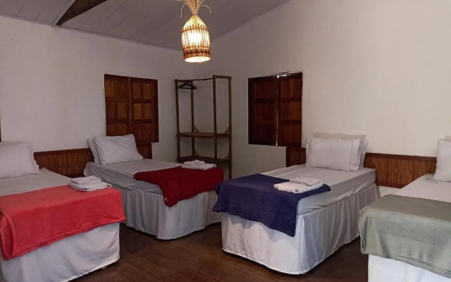 Canoa Hostel e Suites