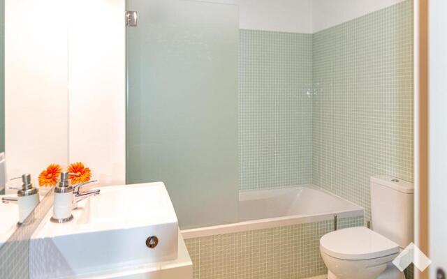 Light-Filled Apartment with Garden • Downtown