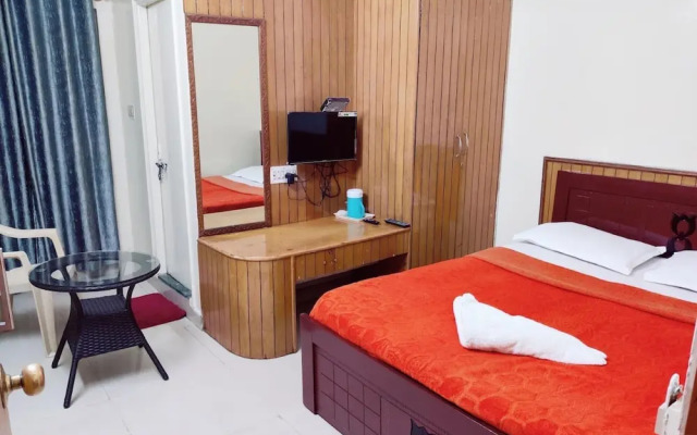 Goroomgo Kaveri Deluxe Lodge Bengaluru