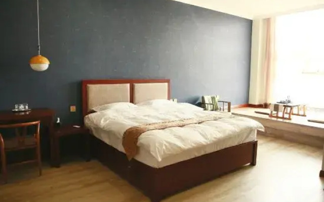 Su · Man Time Inn