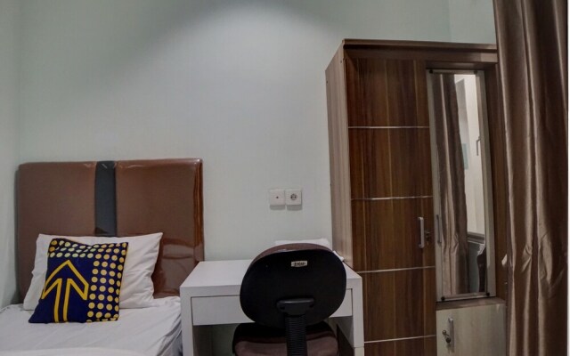 SPOT ON 92822 Finest House Near Amplas Bus Terminal