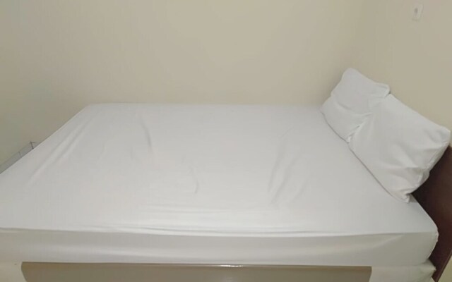 SPOT ON 93464 Penginapan Tulimario Syariah