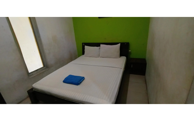 Hotel O Wisma Aluh AmbakNearPantai batu lima Asbullah tmbngn – Guest Rooms – Batu Tungku
