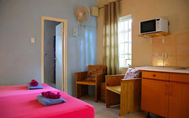 Caribbean Flower Apartments