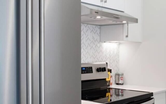 Discover Little Italy From a Bright Apartment