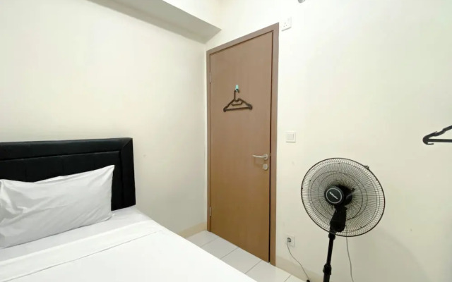 Tidy and Warm 2BR at Podomoro Golf View Apartment