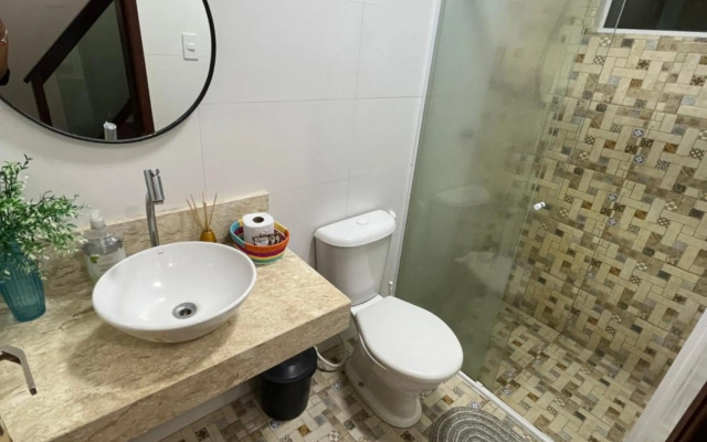 Casa em Condomínio agradável com fundo pro rio