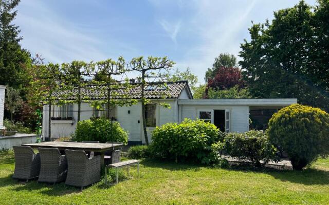 Tiny house in tuin van de statige villa Mariahof