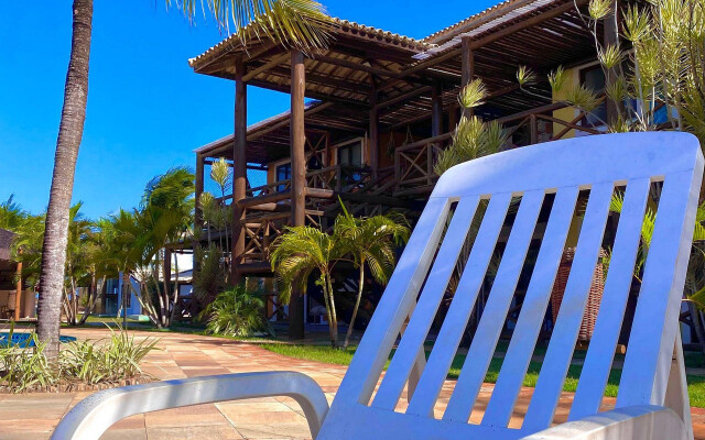 Villages pé na areia em Itacimirim