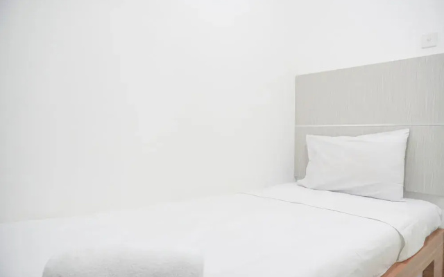 Homey And Strategic 2Br At Bassura City Apartment