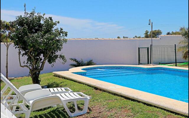 Bungalow Ramos III, con piscina compartida