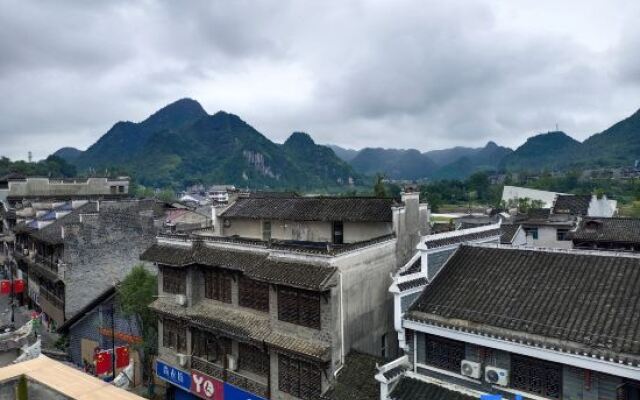 Huaxi Wanjia Homestay