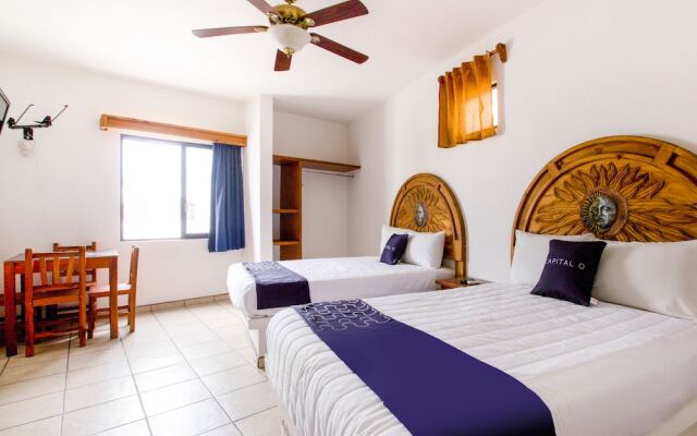 Capital O Hotel J y M