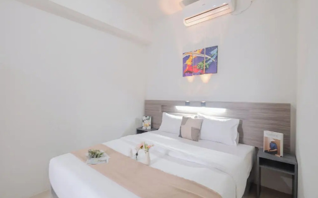 Warm and Spacious 2BR Apartment at Vittoria Residence