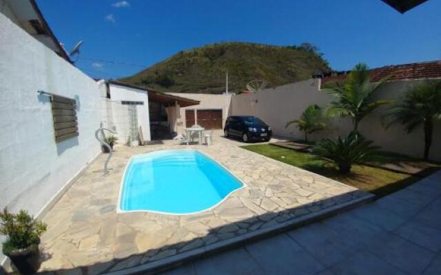 Casa com piscina em Caraguatatuba