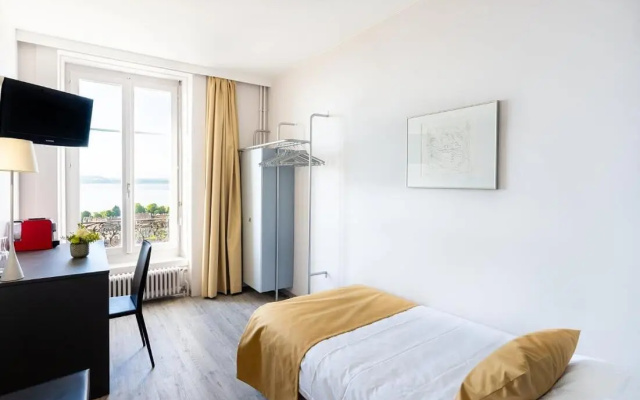 Hôtel Alpes & Lac – Guest Rooms – Neuchatel