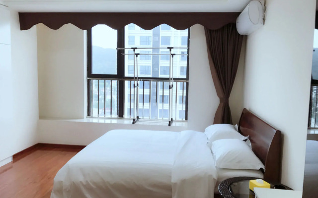 Xingyue Apartment Luogang Wanda