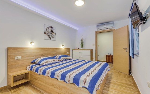 Awesome Home in Novi Vinodolski with WiFi, 4 Bedrooms, Hot Tub
