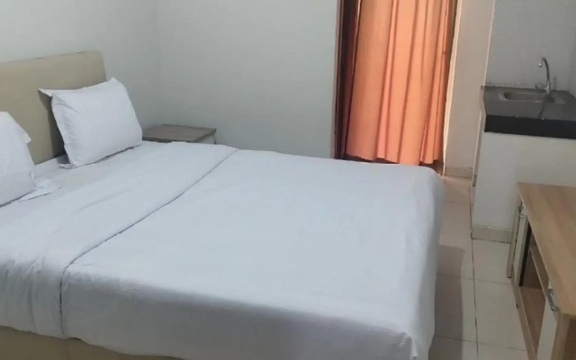 RedDoorz Apartemen @ Green Lake View Cimanggis