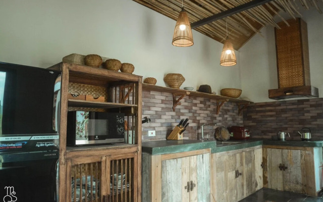 Maison Que