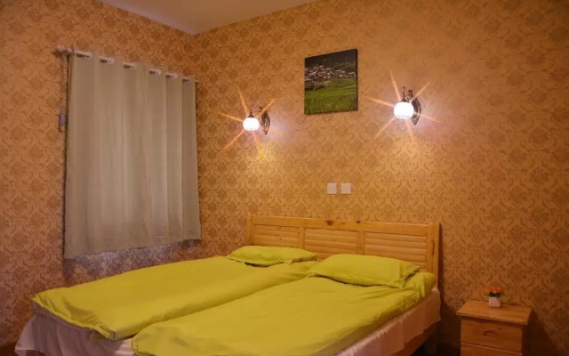 Daocheng Yading Baimaoniu Hotel