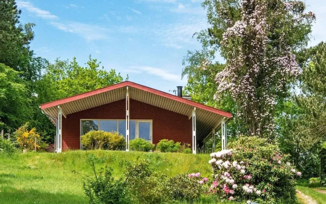 5 person holiday home on a holiday park in Ebeltoft